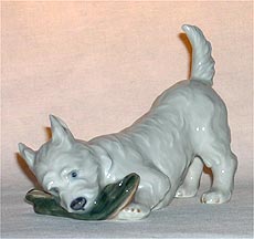 Royal Copenhagen Figurine - Dog With Slipper