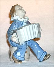 Royal Copenhagen Figurine - Child With Accordion