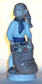Royal Copenhagen Figurine - December, Boy With Sack