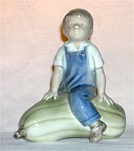 Royal Copenhagen Figurine - Boy With Gourd