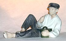 Royal Copenhagen Figurine - Boy At Lunch