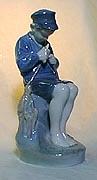 Royal Copenhagen Figurine - Boy Whittling Stick