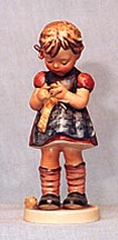 Goebel M I Hummel Figurine - A Stitch In Time