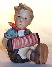 Goebel M I Hummel Figurine - Boy With Accordion