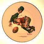 Saturday's Heroes collector plate by Norman Rockwell