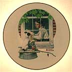 Daydreaming collector plate by Norman Rockwell