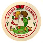 A Merry Christmas collector plate by Joan Walsh Anglund