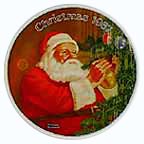 Santa's Golden Gift collector plate by Norman Rockwell