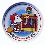 Filling The Stocking collector plate by Charles Schulz