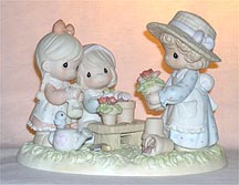 Enesco Precious Moments Figurine - Planting The Seeds Of Love