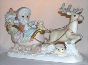 Enesco Precious Moments Figurine - The True Spirit Of Christmas Guides The Way