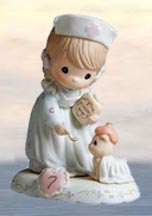 Enesco Precious Moments Figurine - Age 7 (brunette)