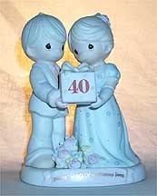 Enesco Precious Moments Figurine - Sharing The Gift Of Forty Precious Years