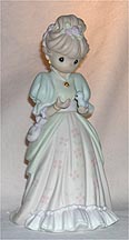 Enesco Precious Moments Figurine - Charity Begins In The Heart