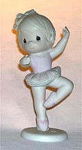 Enesco Precious Moments Figurine - In The Spotlight Of His Grace