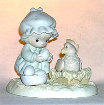 Enesco Precious Moments Figurine - Eggspecially For You