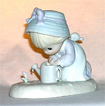 Enesco Precious Moments Figurine - Friendship Grows When You Plant A Seed