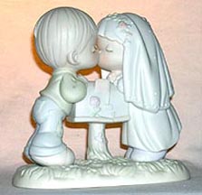 Enesco Precious Moments Figurine - Sealed With A Kiss