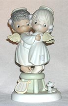 Enesco Precious Moments Figurine - Angels We Have Heard On High