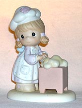 Enesco Precious Moments Figurine - We Knead You Grandma