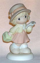 Enesco Precious Moments Figurine - Thursday's Child Has Far To Go