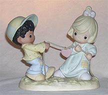 Enesco Precious Moments Figurine - You Tug On My Heart-String