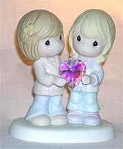 Enesco Precious Moments Figurine - It Is A Happy Heart That Holds A Friend