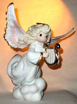 Enesco Precious Moments Figurine - Faith Is Heaven's Sweet Song