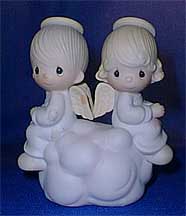 Enesco Precious Moments Figurine - But Love Goes On Forever
