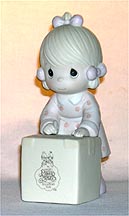 Enesco Precious Moments Figurine - Sharing Is Universal