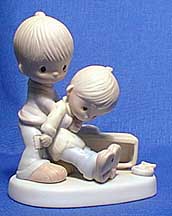 Enesco Precious Moments Figurine - Love Lifted Me