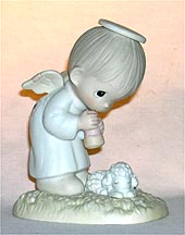 Enesco Precious Moments Figurine - God's Ray Of Mercy