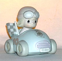 Enesco Precious Moments Figurine - Ten Years And Still Going Strong